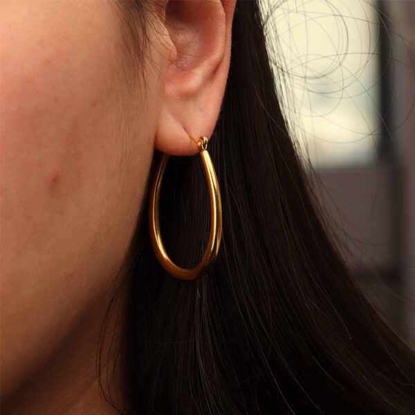 Chris April 316L stainless steel PVD plated gold oval hoops earring - Image 5