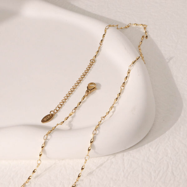 Chris April in stock 316L Stainless steel PVD plated minimalist thin choker wave chain necklace - Image 4