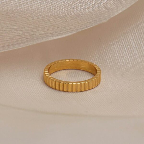 Chris April 316L stainless steel PVD gold plating gear stripe wavy band ring - Image 6